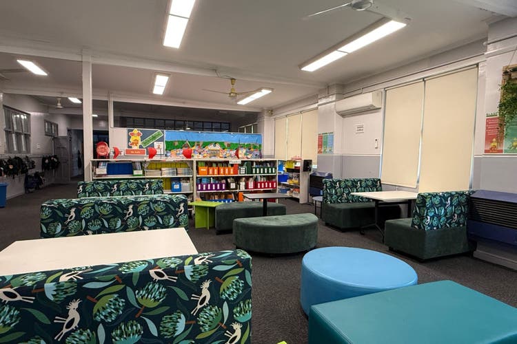 Photograph of the open learning space with modern classroom furniture.