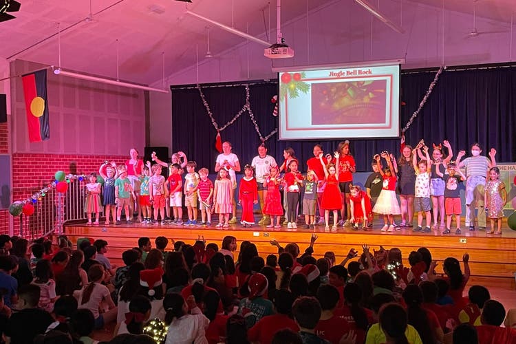 Photograph of students performing carols at a Gala Night.