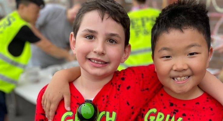 Photograph of two male students during a gala night.